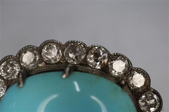 A Victorian yellow metal brooch, with oval turquoise cabochon surrounded by old-cut diamonds, 23mm.